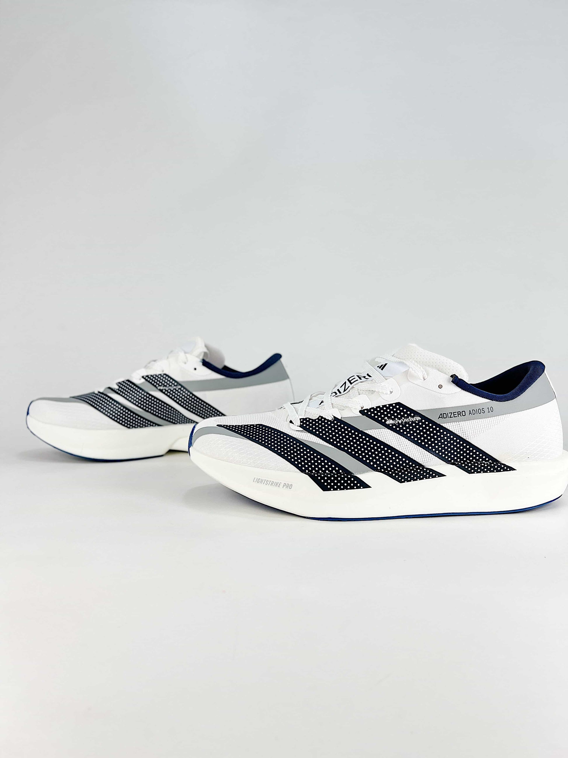 Adidas Adizero Adios 10 – Pair side view
